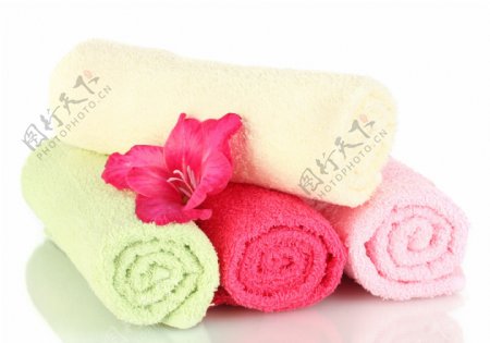 spa毛巾与鲜花图片