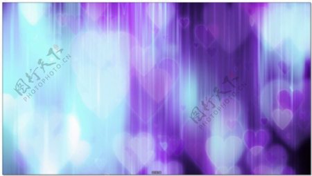 紫色梦幻光效中的光晕桃心视频空间素材