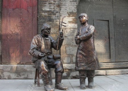 巴洛克街铜雕歌女图片