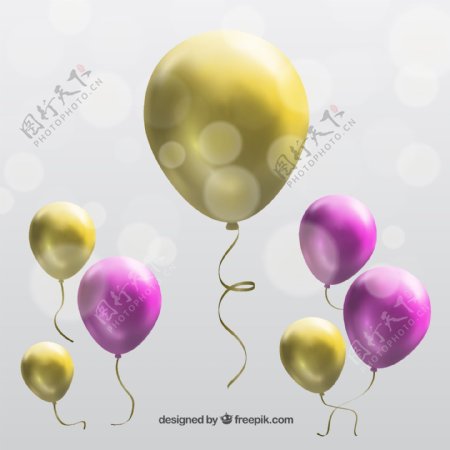 粉红色和金色的气球
