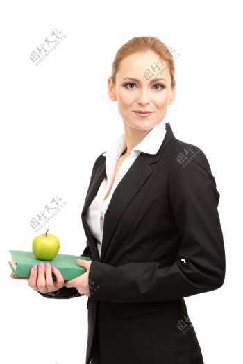 手拿书本苹果的职业女性图片