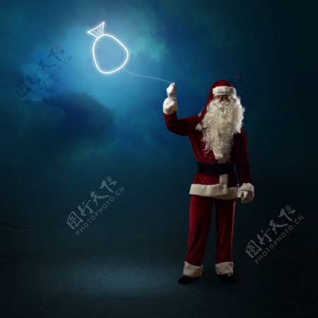 放礼物风筝的圣诞老人图片