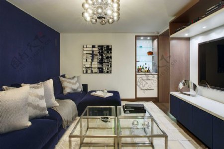 时尚客厅蓝色沙发背景装修效果图